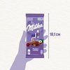 Шоколад молочный MILKA с дробленым фундуком и изюмом, 85г - фото undefined