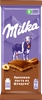 Шоколад молочный MILKA с добавлением ореховой пасты и дробленным фундуком, 80г - фото 0