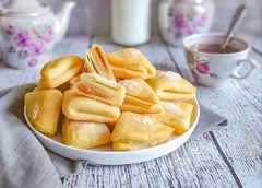 Творожные ушки с вареной сгущенкой