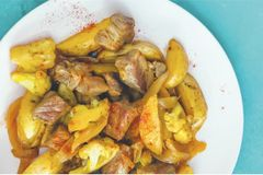 Рагу из свинины с овощами и карри