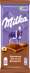 Шоколад молочный MILKA с добавлением ореховой пасты и дробленным фундуком, 80г